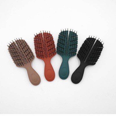 Direct factory sale colorful cute mini leaf shape rubber detangling plastic hair brush for kids with nylon pins